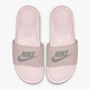 Baby pink Nike slides